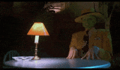 Movie gif. Jim Carrey as the the Mask sits at a nightclub table. His jaw drops open in a cartoonish way, super long tongue rolling out onto the table, and eyes bursting forward.