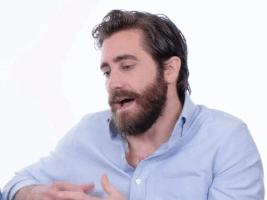 Celebrity gif. Giving an interview, Jake Gyllenhaal wrings his hands and raises his eyebrows as he says, "I come across as somebody who probably is not that sharp."