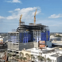 Controlled Explosion Takes Down Damaged Cranes at Hard Rock Hotel Site in New Orleans