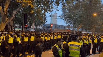 Heavy Police Presence Reported in Shanghai as Protests Continue Across China