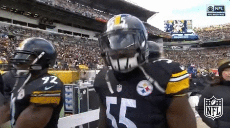 Sports gif. Arthur Moats from the Pittsburgh Steelers is wearing his full uniform and helmet and he nods enthusiastically at the camera.