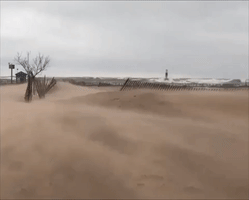 Strong Wind Kicks Up Sand on Lake Michigan Shore