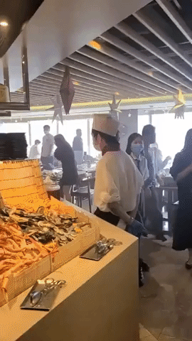 Haze of Smoke in Restaurant as Fire Breaks Out at World Trade Centre in Hong Kong