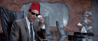stressed international man of mystery GIF