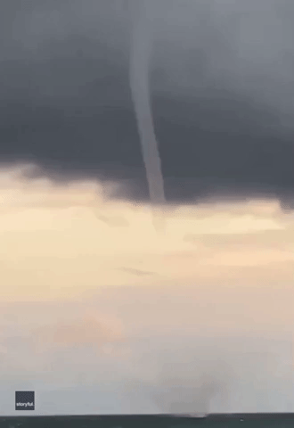 French Beachgoers Marvel at Waterspouts