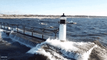 Lake Michigan Lighthouse Gets 'Completely Swallowed' by Crashing Waves