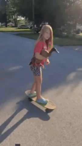 Rescued Duck Hitches a Ride on Skateboard With Kentucky Girl