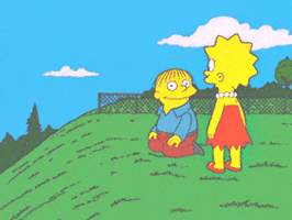 The Simpsons gif. Lisa looks at Ralph who sits on his knees on the side of a steep hill. She watches as Ralph smiles and falls over, rolling down the hill. 