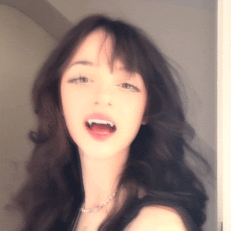 Biting Beautiful Girl GIF