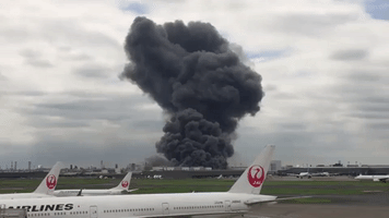 Black Smoke Clouds Tokyo Airport After Factory Fire