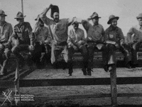 NationalWWIMuseum celebration black and white smiling jumping GIF