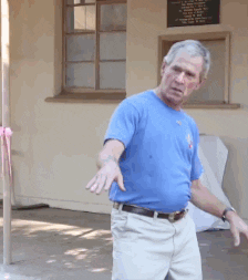 Political gif. George W. Bush dances. He shakes his shoulders and hips while holding his arms out. 