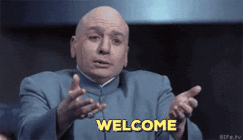 Movie gif. Mike Myers as Dr. Evil from Austin Powers reaches out his arms, as if to welcome someone into a hug. Text,