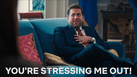 Movie gif. Jonah Hill as Jason Orlean in Don't Look Up, sitting on a couch, puts his hand over his chest and says, "you're stressing me out!"