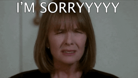 Movie gif. Diane Keaton as Annie in First Wives Club shakes her head in a fit of frustration as she screams, "I'm sorry!"
