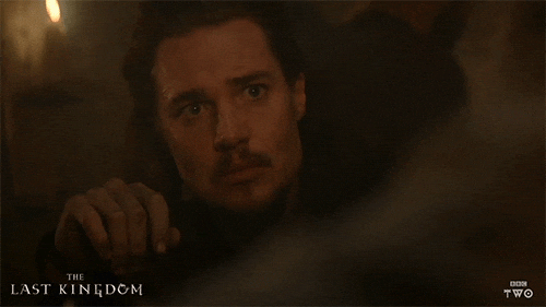 TV gif. Alexander Dreymon as Uhtred on The Last Kingdom rolls his eyes and looks away from someone with disappointment and boredom.