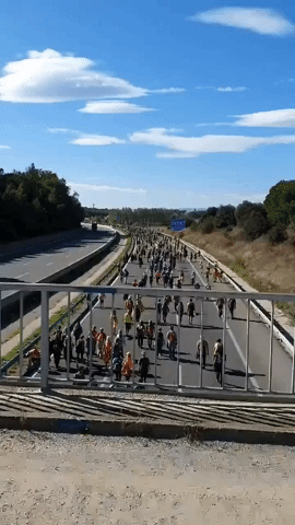 Hundreds of Pro-Catalan Demonstrators March Down Highway Near Girona