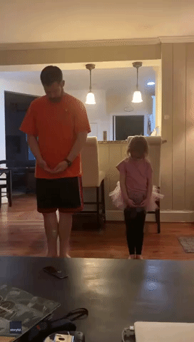 Dancing Dad Practices Ballet With Daughter