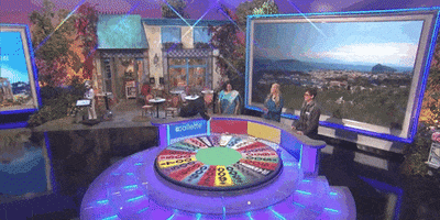 spin the wheel GIF by Wheel of Fortune