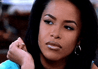 Movie gif. Aaliyah as Trish O'Day from Romeo Must Die wearily rolls her eyes and looks away, as if she's done talking about it.