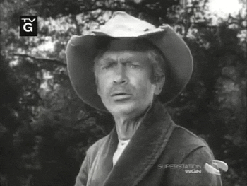 TV gif. Buddy Ebsen as Jed `Clampett in The Beverly Hillbillies stares in confusion.