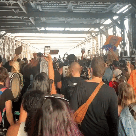 Crowd Marches Over Brooklyn Bridge on Anniversary of George Floyd's Death