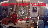 Celebrity gif. Clip from Beyonce's video for "7/11" where she is hopping out of Christmas boxes around a living room while wearing pajamas. Fireworks are overlaid, and text says "Happy New Years."