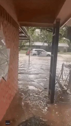 Good Samaritans Help Push Car Through Floodwaters as Torrential Rain Hits Abilene, Texas