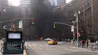 Smoke Rises in Midtown Manhattan as NYPD Truck Catches Fire