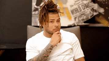 Video gif. Tyrann Mathieu of the New Orleans Saints looks at us then sighs and shakes his head in a disapproving or disappointed way.