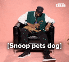 Snoop pets dog