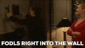 folds right into the wall GIF