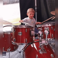 Drum-Crazy Farm Boy Plays on Makeshift Kit