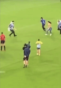 Pitch Invader Tackled During Rugby Match