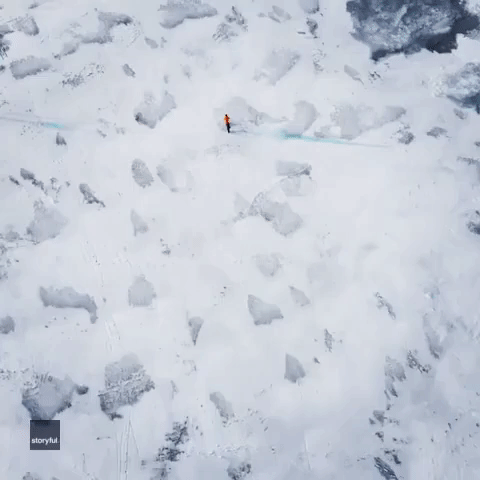 Dad's Drone Follows Adventurous Son as He Cycles on Frozen Lake Michigan