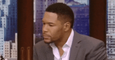 Celebrity gif. Michael Strahan stares straight at us with a pained smile before raising his eyebrows and shaking his head multiple times in complete disbelief.