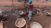 AOKlabs work woman cooking african GIF