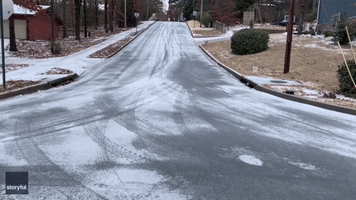 Big Fun in Little Rock as Icy Street Proves Perfect for Sledding