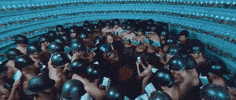 holymountain crowd helmet swaying alejandro jodorowsky GIF