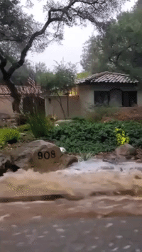 Floodwater Streams Down Streets in Montecito, California