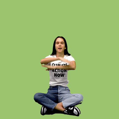 Digital art gif. Young woman sitting cross-legged wearing a t-shirt that says, "Climate action now," waves her arms above her head in an arcing motion, a cartoon rainbow appearing between them. Text above the rainbow says, "Reduce, reuse, recycle," all against a green background.
