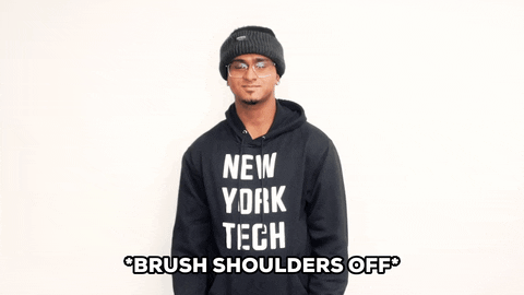 Video gif. Teenager brushes both of his shoulders before adjusting his hoodie cockily. Text, "Brushes shoulders off."
