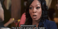 shakin the table GIF