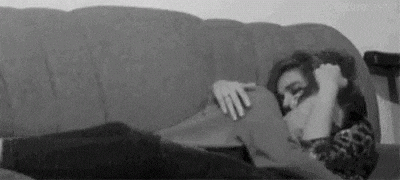 Affectionate touch example – couple cuddling on couch