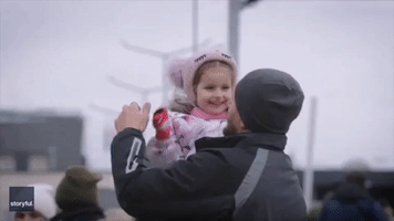 Embrace of Father and Daughter at Polish Border Leaves Photographer Speechless