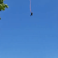 First-Time Bungee Jumper Gives Friend Something to