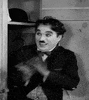 he looks so happy i loev it charlie chaplin GIF by Maudit