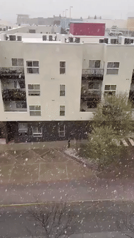 Snow Shower Hits Oklahoma City's Bricktown Area