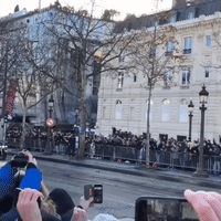 Motorcyclists Parade Through Paris in Memory of Rockstar Johnny Hallyday
