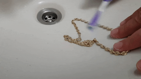 DurabilityMatters giphyupload cleaning gold chain GIF